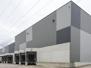 Het betreft de verhuur van een logistiek gebouw te Olen, gelegen langs het Albertkanaal en nabij op- en afrit 23 (Turnhout-West) van de E313. Het gebouw heeft een totale oppervlakte van ca. 24 064 m², bestaande uit ca. 18 266 m² opslagruimte, ca. 2014 m
